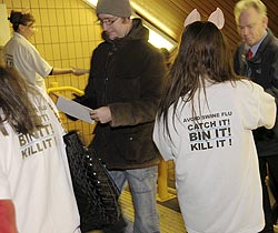 UK Government message being passed out to commuters in Merseyside